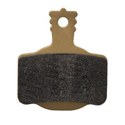 Disc brake pad with black friction material and brown backing plate
