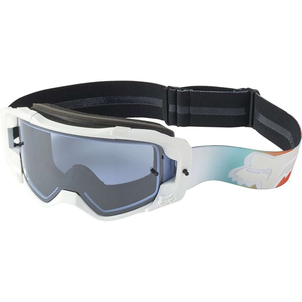 Multicolor ski goggles with white frame, tinted lenses, and black adjustable strap