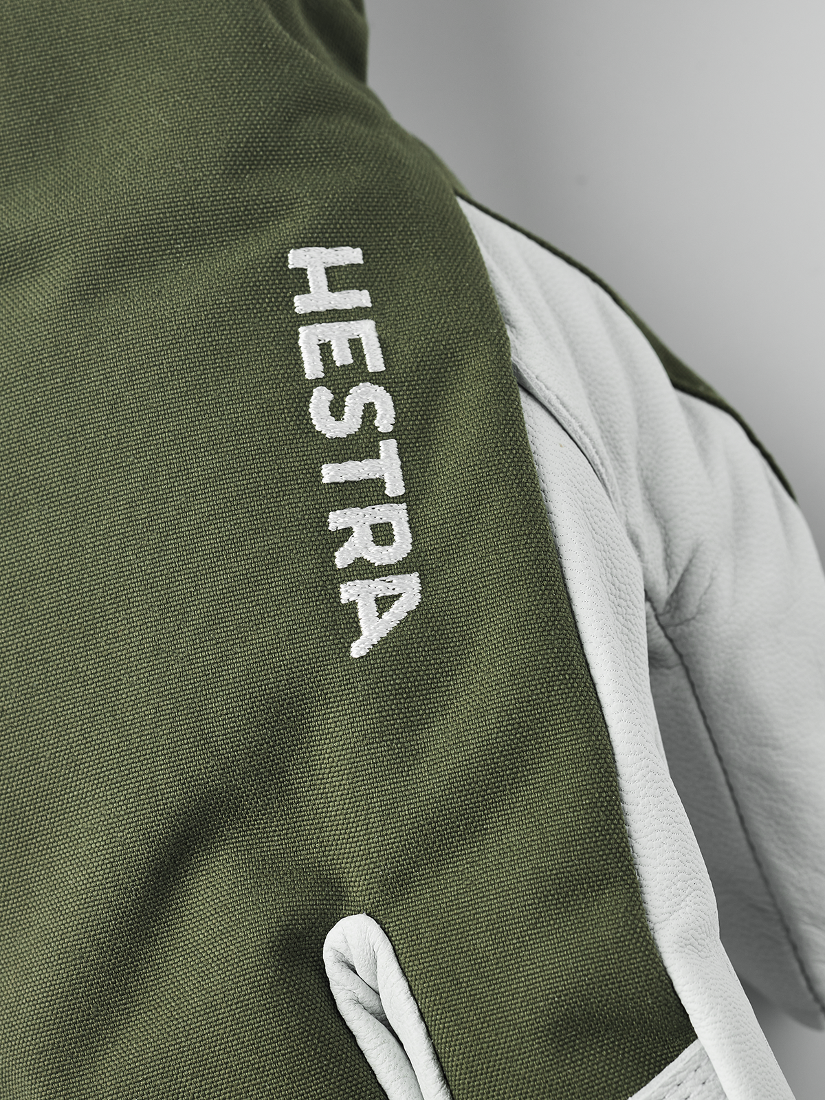 Hestra Army Leather Heli Ski 3-finger gloves in olive green with white leather palm