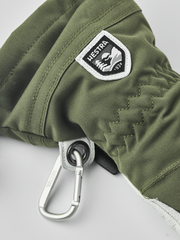 Hestra Heli ski gloves in olive green with Hestra logo patch and carabiner clip