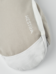 Beige powder gauntlet mitten with white leather palm and Hestra logo on back