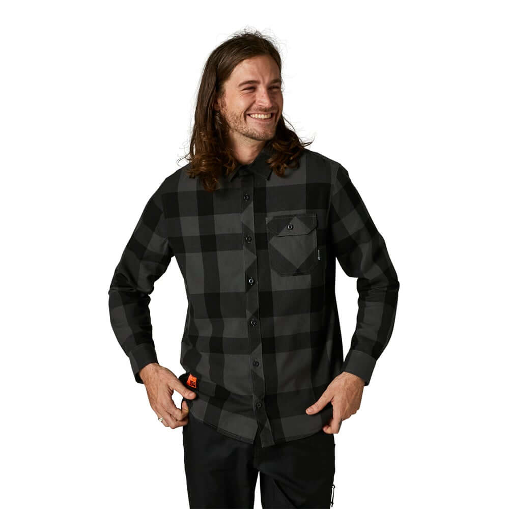 Men's black plaid flannel button-up shirt, long sleeves, chest pocket.
