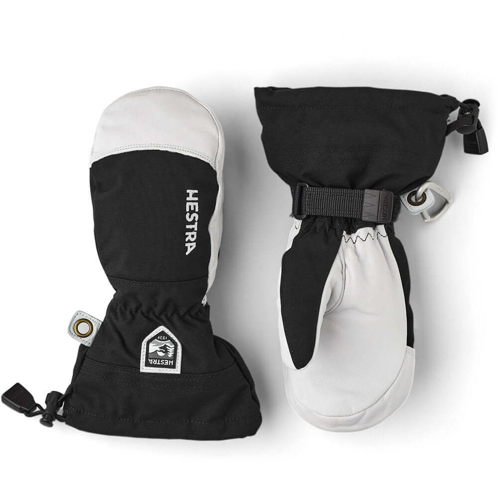 Youth ski mittens in black and white with adjustable wrist strap and drawcord