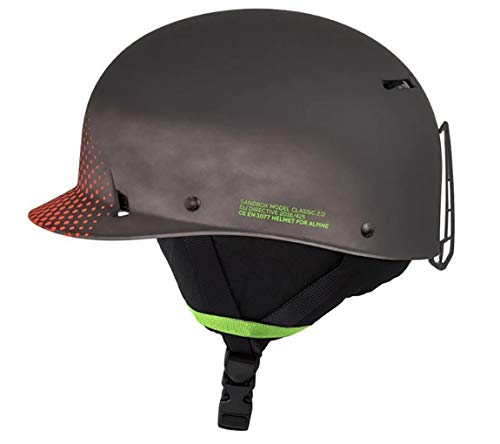 Matte gray snow helmet with orange dotted side panel and neon green chin trim