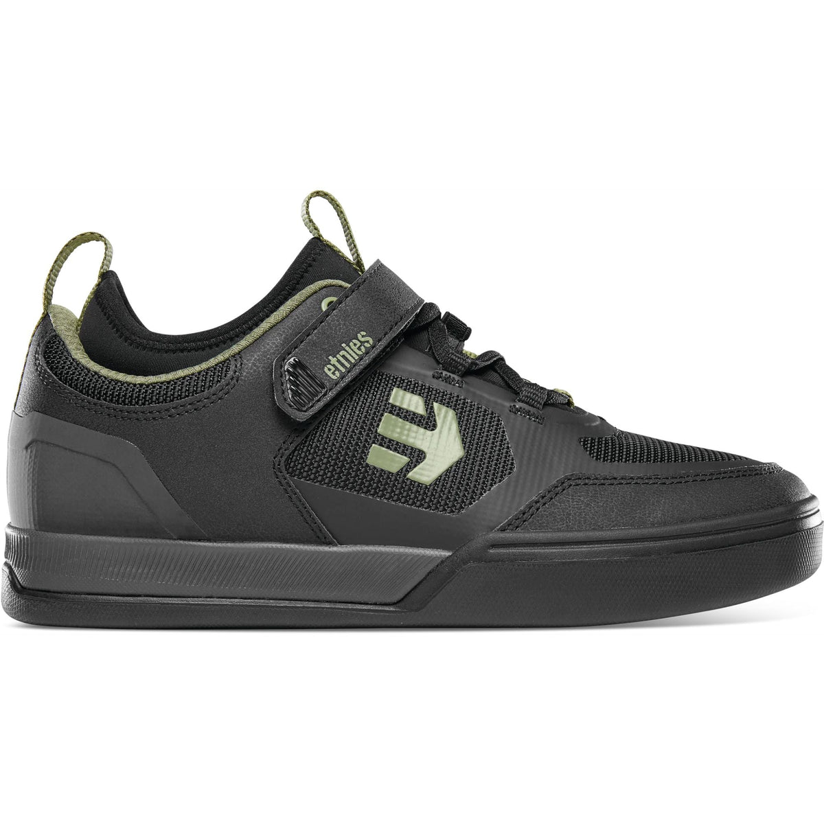 Etnies black low-top bike shoe with Velcro strap and green logo detail