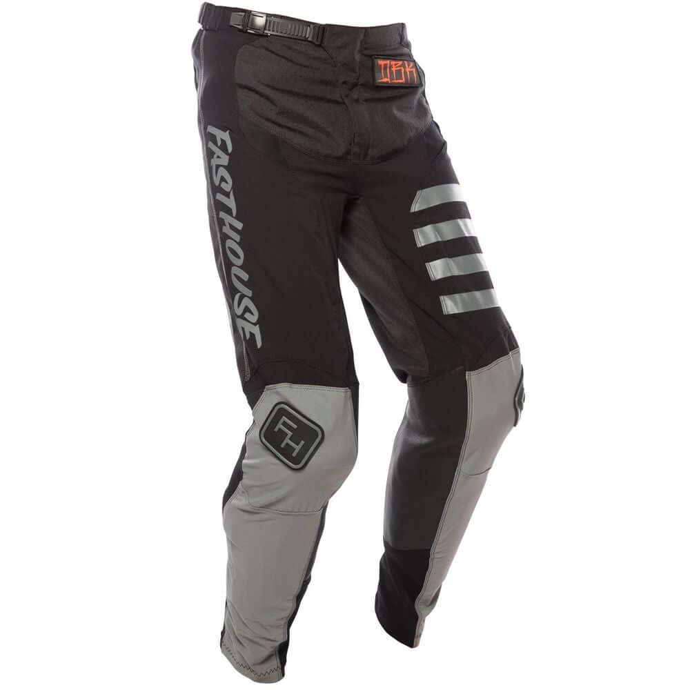 Fasthouse Raven Twitch motorcycle pants in black with gray panels and logo stripes