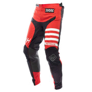 Red and black motocross riding pants with reflective stripe graphics and knee patches.