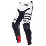 White and black motorcycle riding pants with check patch, bold stripe graphics, and red cuffs