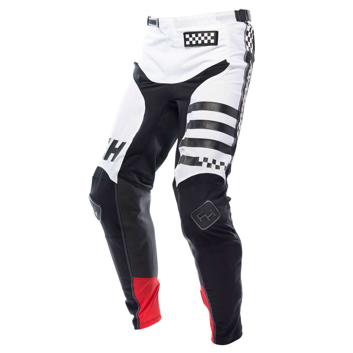 White and black motorcycle riding pants with check patch, bold stripe graphics, and red cuffs
