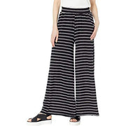 Women's black and white striped wide-leg pants with elastic waist and front seam detail