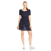 Midnight printed baby doll dress with short sleeves and flared gathered skirt.