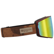 Snow goggles with yellow mirror lens and brown strap with DRAGON EST 1993 label