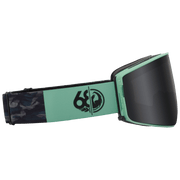 PXV2 snow goggles with teal-and-black patterned strap and dark lens