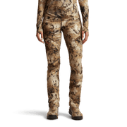 Women’s hunting pants in tan and brown camouflage print with cargo-style thigh pockets
