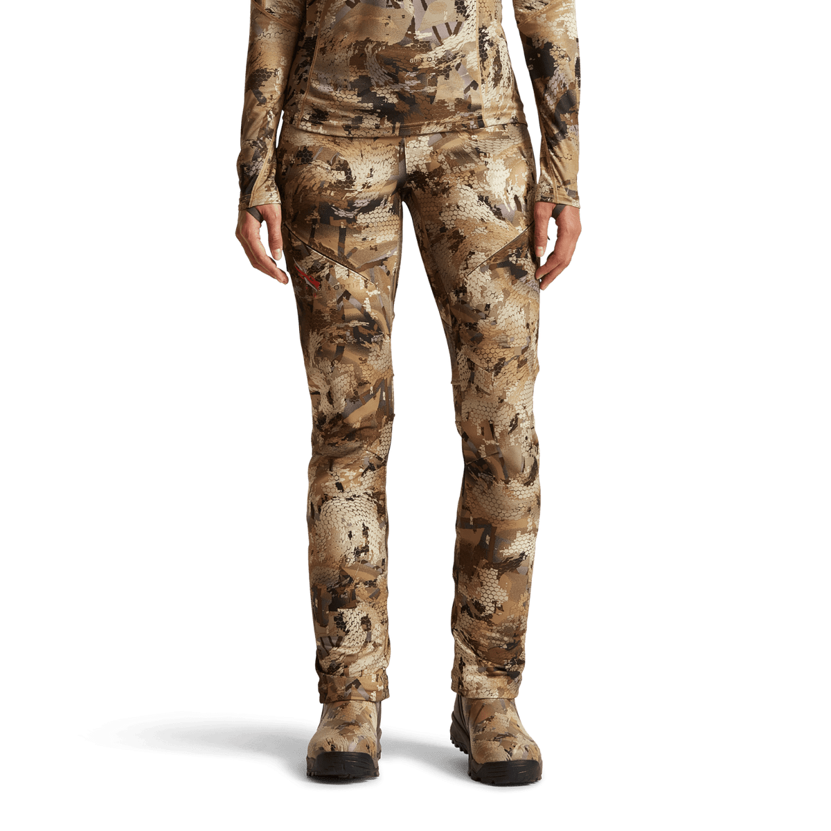 Women’s hunting pants in tan and brown camouflage print with cargo-style thigh pockets
