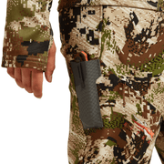 Hunting pants close-up with multicolor digital camo and gray zippered leg pocket