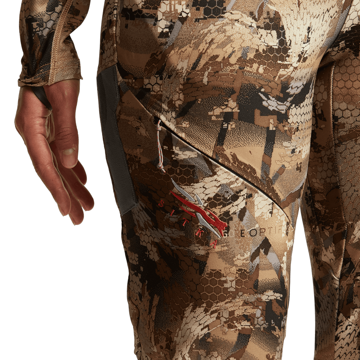 Hunting pants close-up of camo thigh panel with utility pocket and adjustable strap