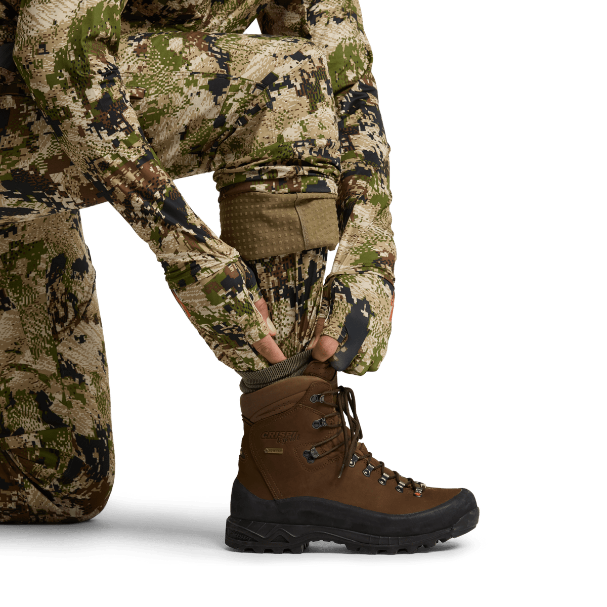 Men’s camo hunting pants with boot cuff and leg pocket near the ankle