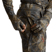 Men's camouflage hunting pants with adjustable strap at ankle and cargo pocket