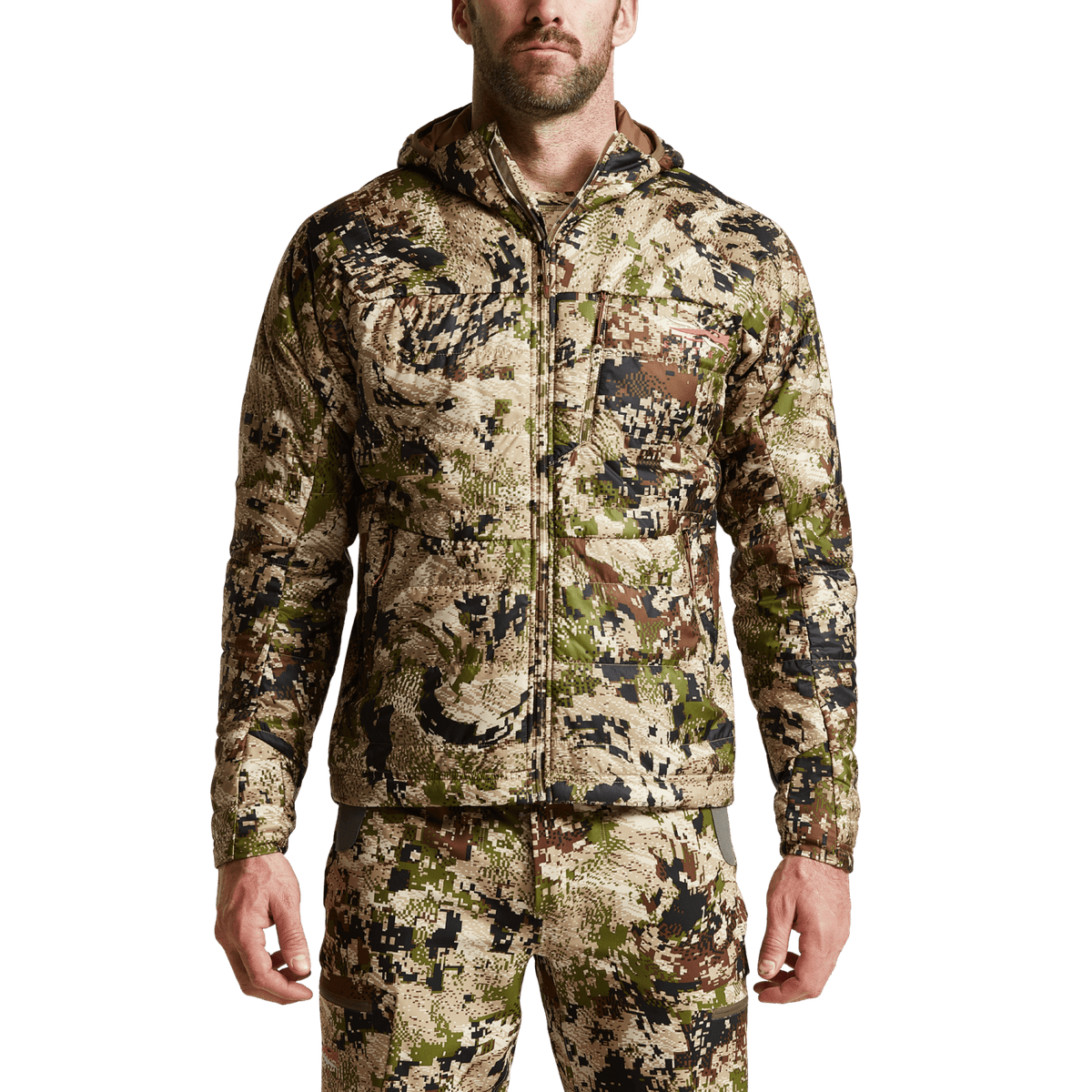 SITKA camo hooded jacket on model, full-zip front and elastic cuffs.