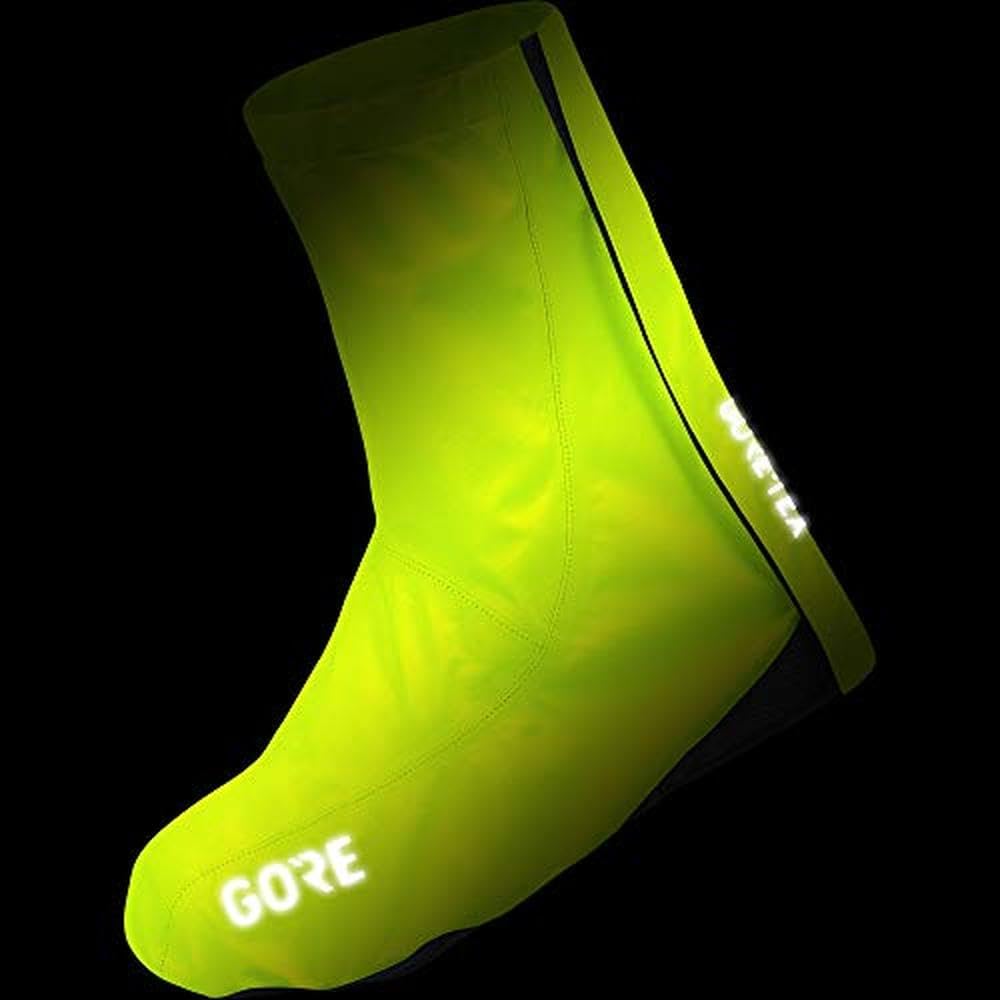 Neon cycling shoe covers with GORE lettering on the toe and Gore-TEX panel