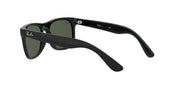 Ray-Ban Justin RJ9069S sunglasses, black frame with dark green lenses, angled view