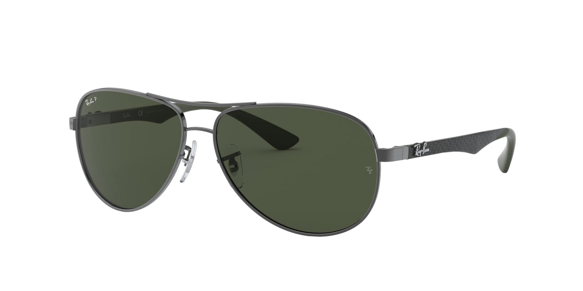 Aviator sunglasses with dark green mirrored lenses and silver metal frame