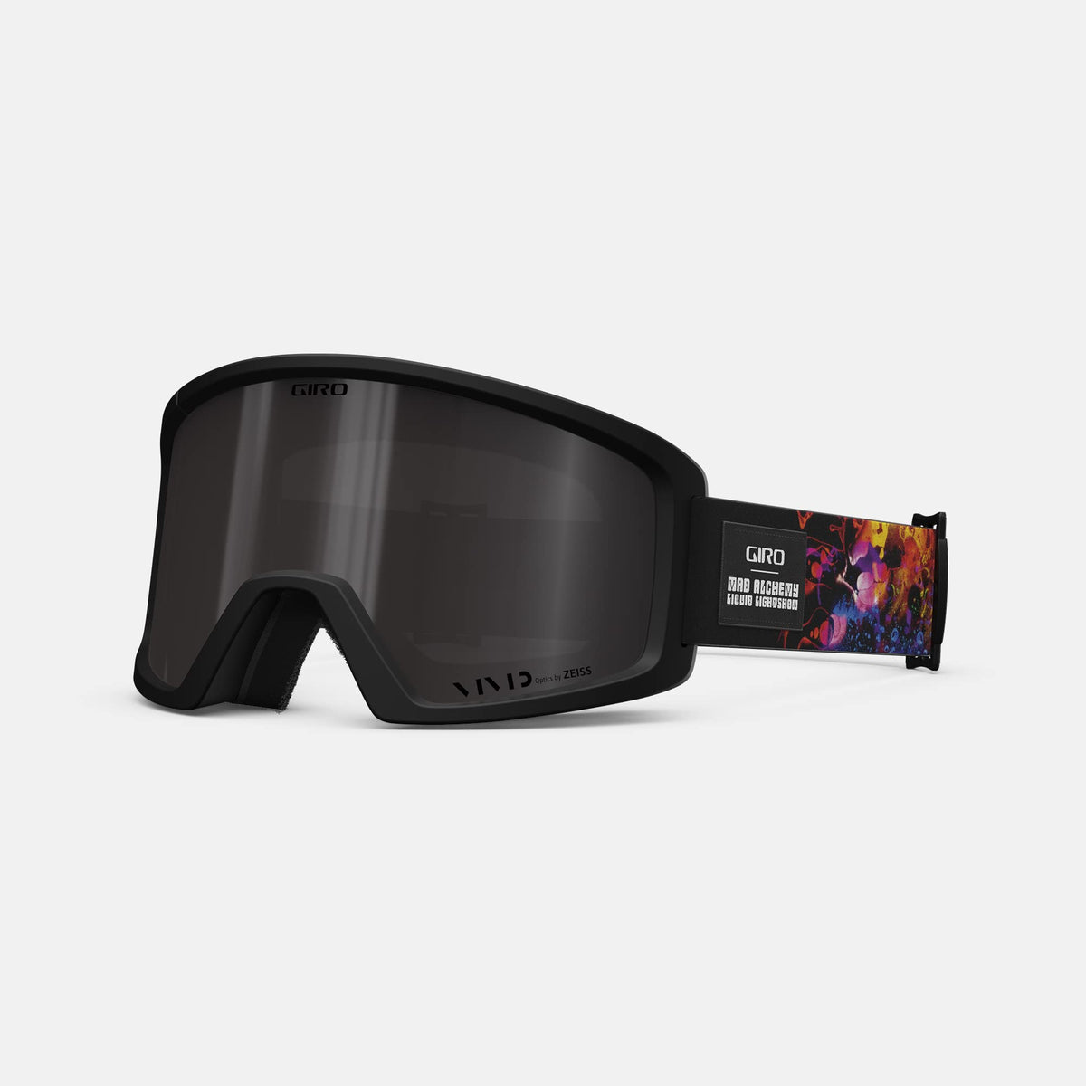 Snow goggles with black frame and dark lens; strap has colorful graphic design.