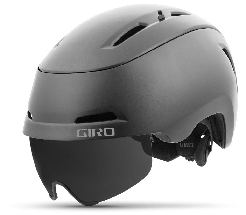 Matte titanium bike helmet with attached visor and chin strap, side logo