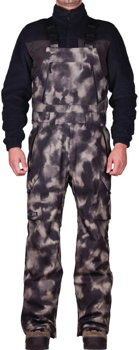 Men's snow bib pants with tie-dye camo print, dark bib, adjustable straps