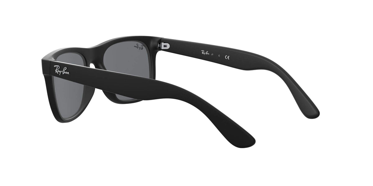 Ray-Ban Justin RJ9069S sunglasses, black frame with dark lenses, angled view