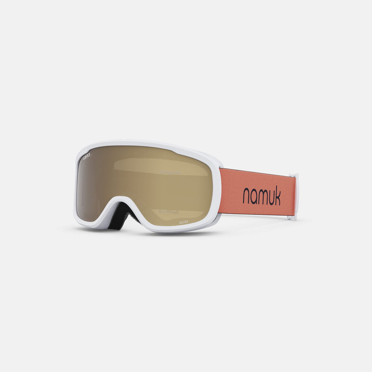 White snow goggles with amber lens, orange namuk strap
