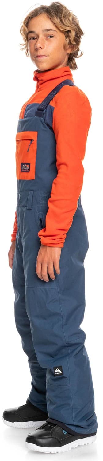 Boys' insulated snowboard bib overalls, orange sleeves and blue bib overalls, side view