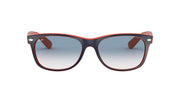 Ray-Ban Wayfarer sunglasses with red-orange frame and dark gradient lenses.