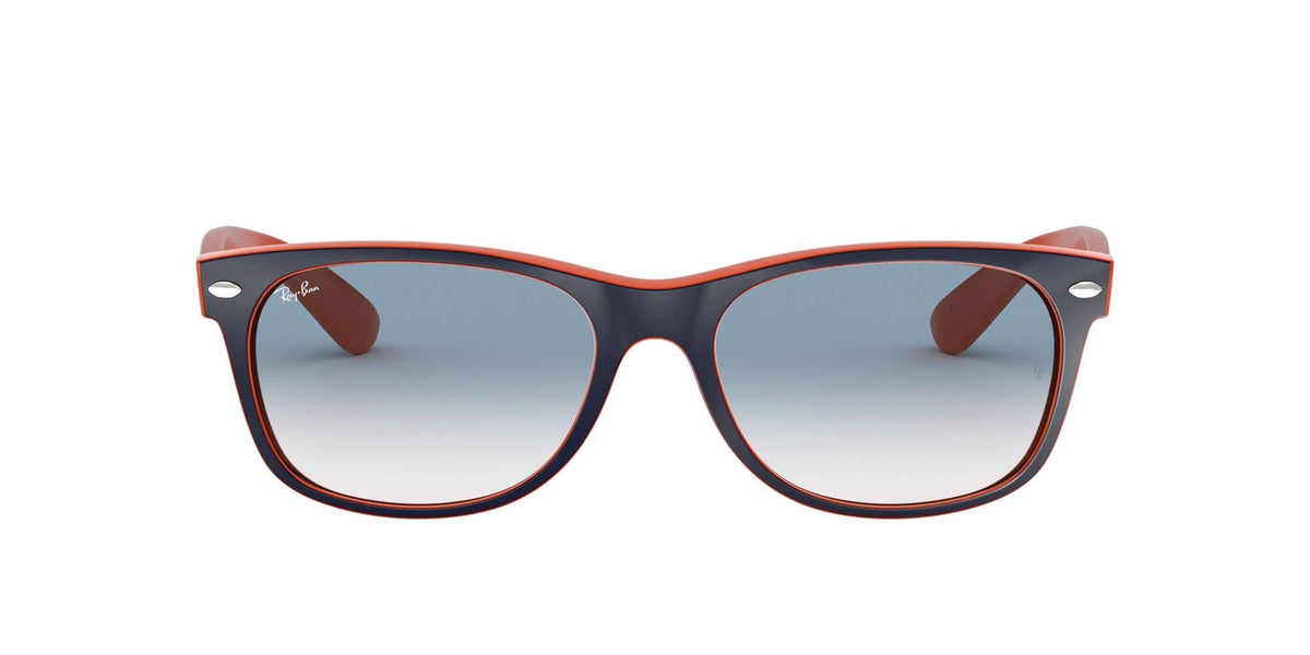 Ray-Ban Wayfarer sunglasses with red-orange frame and dark gradient lenses.