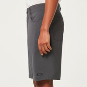 Oakley hybrid 21-inch shorts in dark grey, side view with curved front pocket