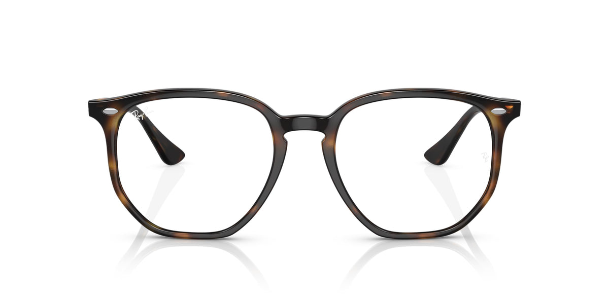 Sunglasses with dark tortoiseshell frame and clear lenses, centered front view.