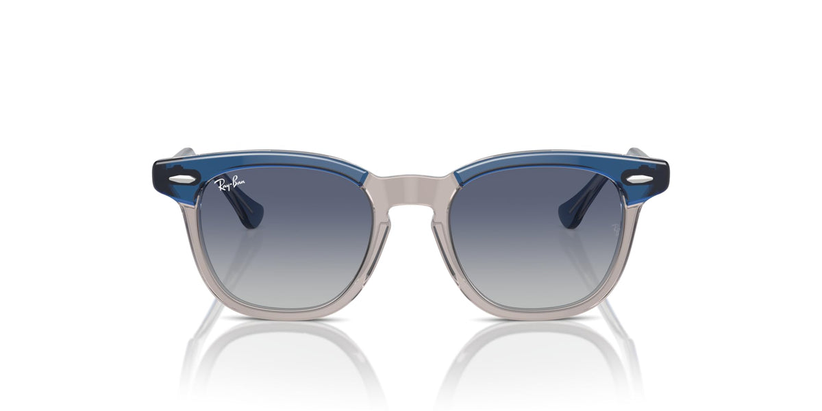 Ray-Ban RJ9098S blue sunglasses with gradient lenses and clear/blue frame arms