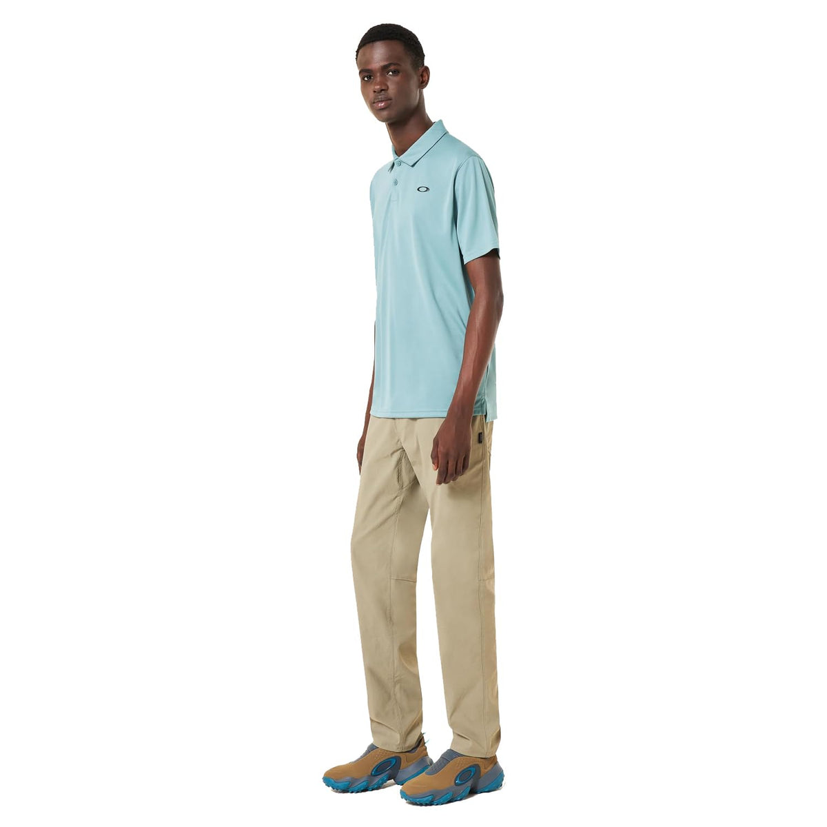 Men's light teal blue polo shirt with short sleeves, collar, and Oakley chest logo