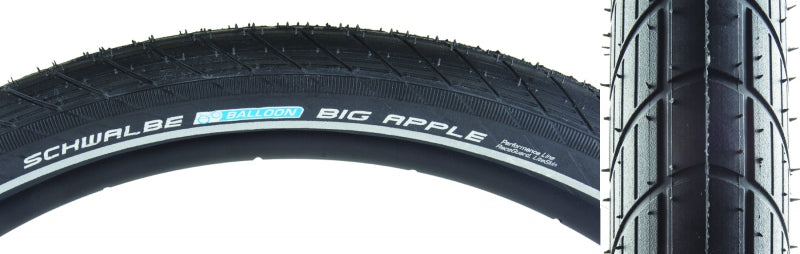 Black bicycle tire with chunky tread, side lettering, and reflective stripe
