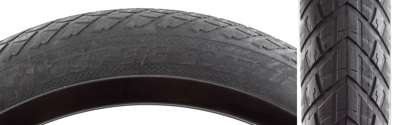 Black bicycle tire with textured tread pattern and smooth sidewall