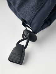 Navy powder gauntlet glove cuff with drawcord toggle and black pull tab
