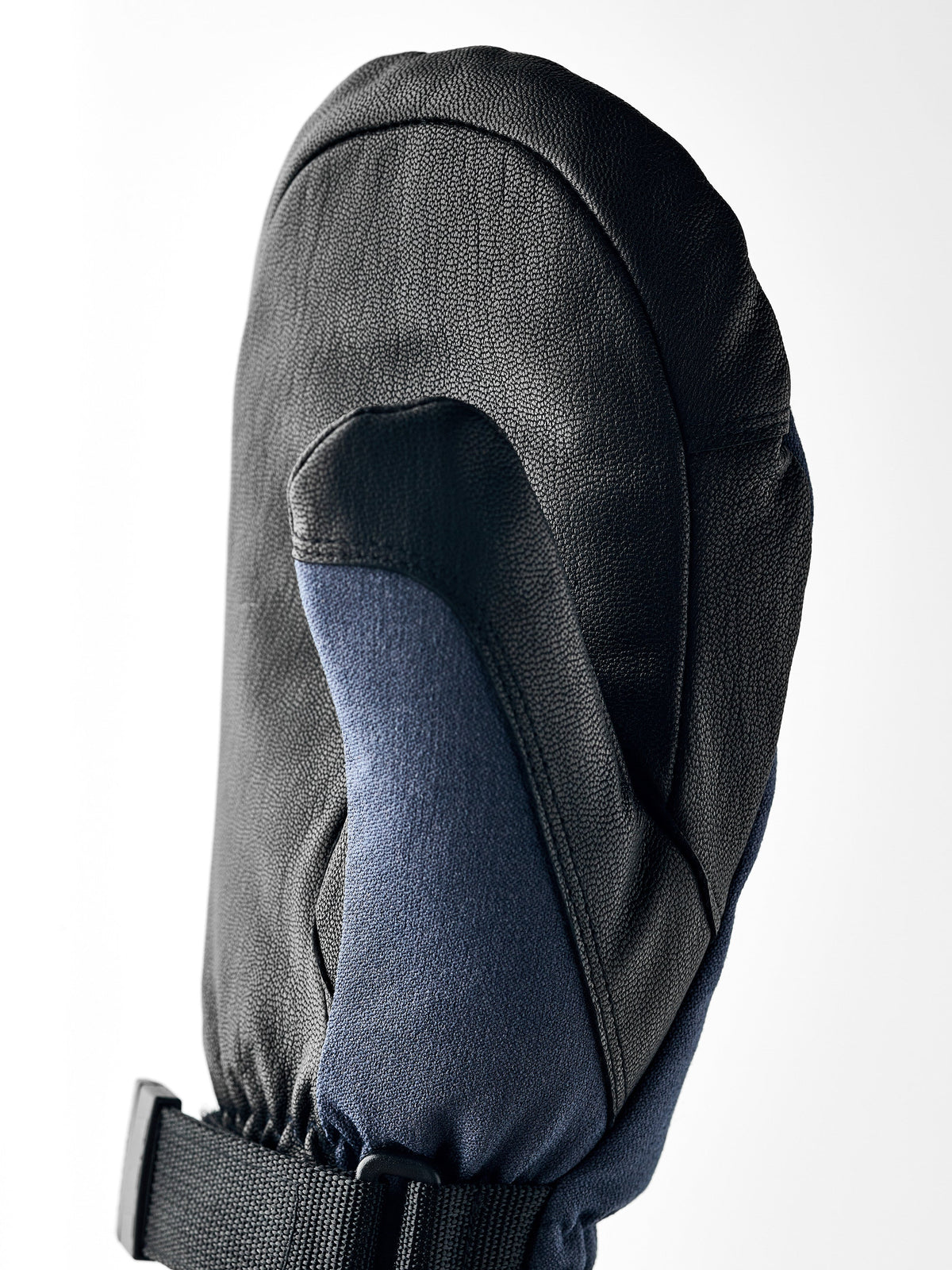 Hestra CZone Mountain mittens in black with blue interior lining and cuff strap