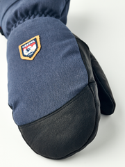 Navy denim mountain mittens with black leather palm and HESTRA patch