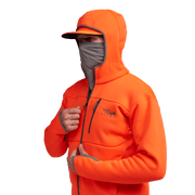 Traverse hoodie in Blaze Orange, side view with face-covering hood panel