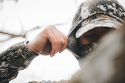 Traverse hoodie hood and sleeve cuff in pixel camouflage, showing thumb pull area
