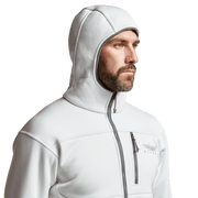 White hooded zip jacket close-up with drawcord-free hood opening