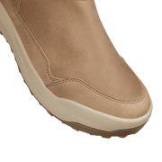 Buckskin suede hiking boot toe with stitched seam and textured light rubber sole edge