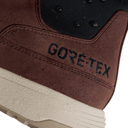 GoTex logo on brown suede boot shaft with stitched seams and textured outsole