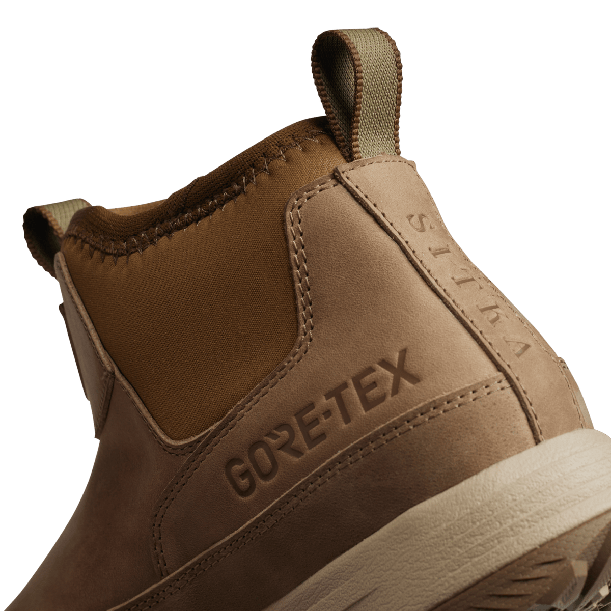 Tan leather hiking boot with GORE-TEX logo and cushioned midsole